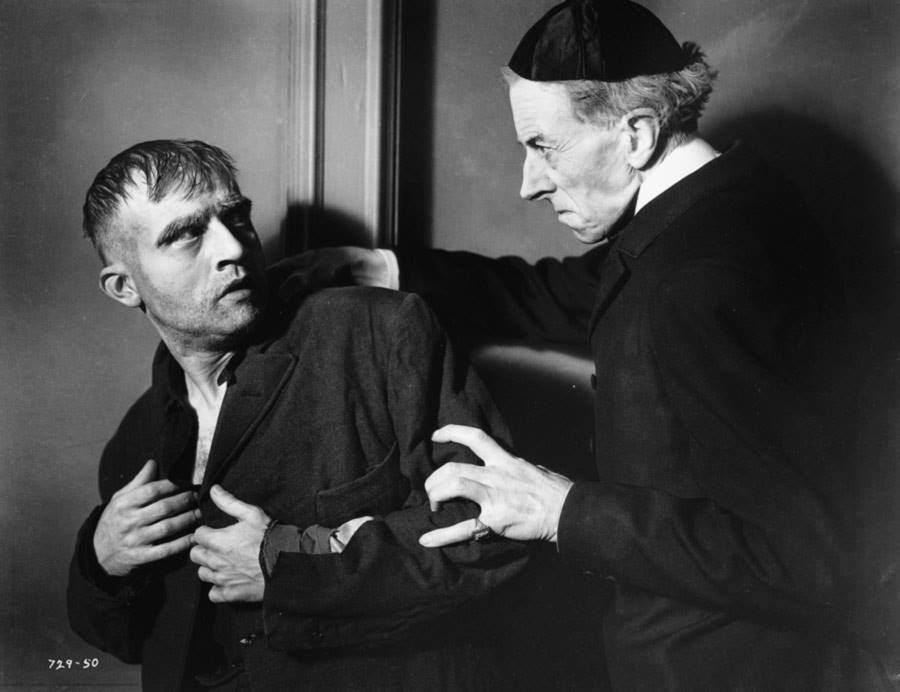 Dwight Frye as Karl (left) and Ernest Thesiger as Dr. Pretorius (right) in <i>Bride of Frankenstein</i> (1935)