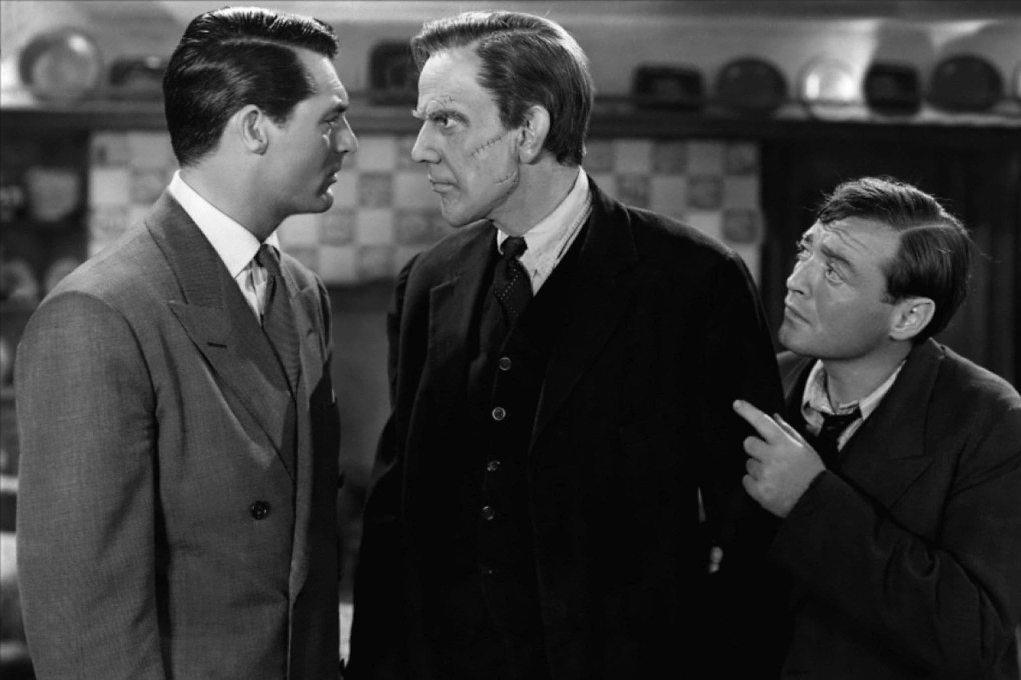 Cary Grant as Mortimer Brewster (left), Raymond Massey as Jonathan Brewster (center), and Peter Lorre as Dr. Einstein in <i>Arsenic and Old Lace</i> (1944)